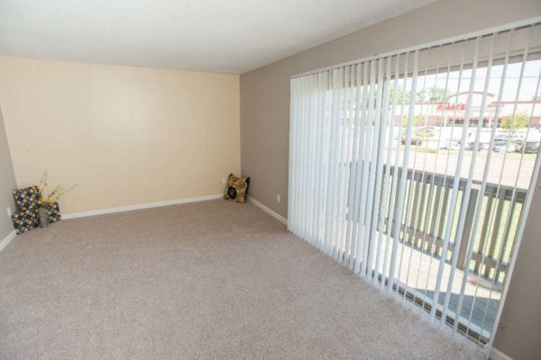 Living room with window in Jackson, TN
