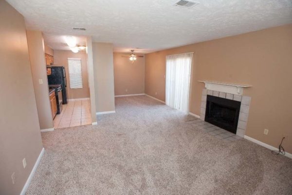 Living room with fireplace in Jackson, TN